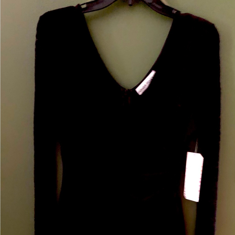 NWT Almost Famous black short dress. Lace sleeves, zipper back. Jr size L